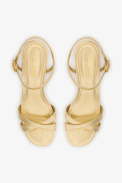 Bianca Low Sandal In Platina Metallic Leather
